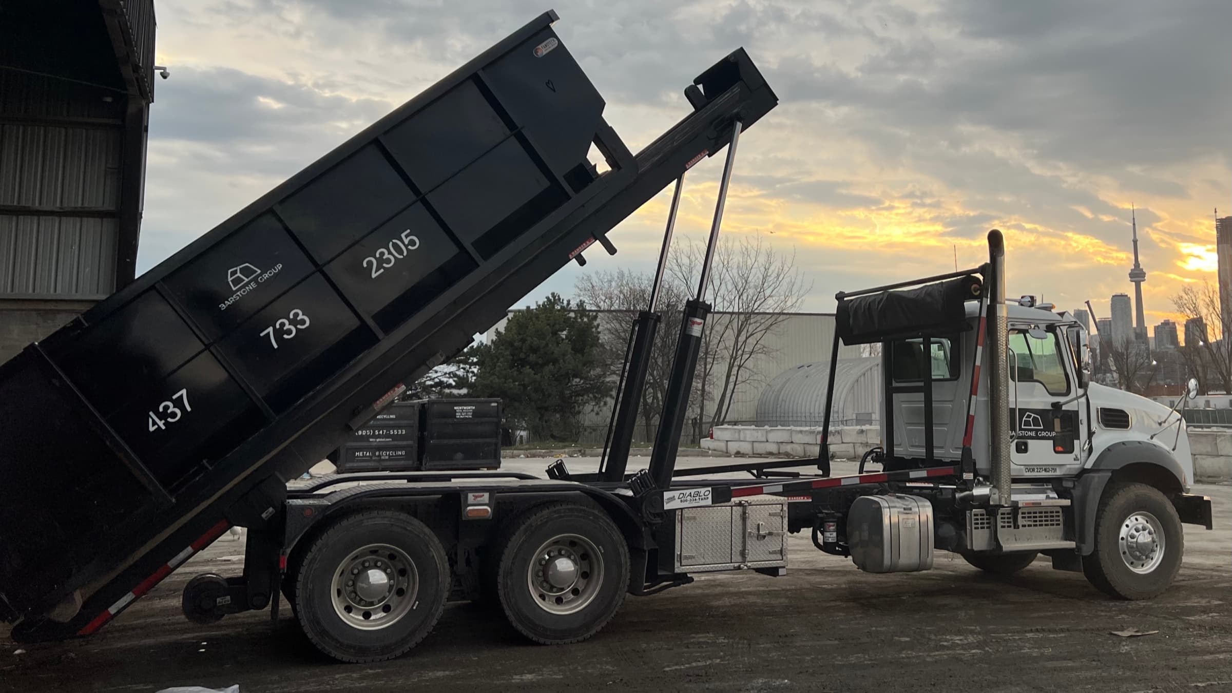 Barstone roll-off bins staged in the yard